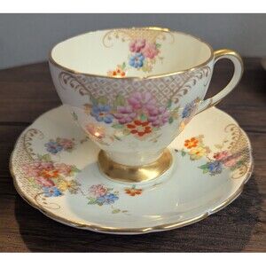 EB Foley Tea Cup Saucer Floral Hand Painted 1850 Made in England Bone China